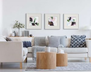 Transformations prints purple grouping above sofa (1)