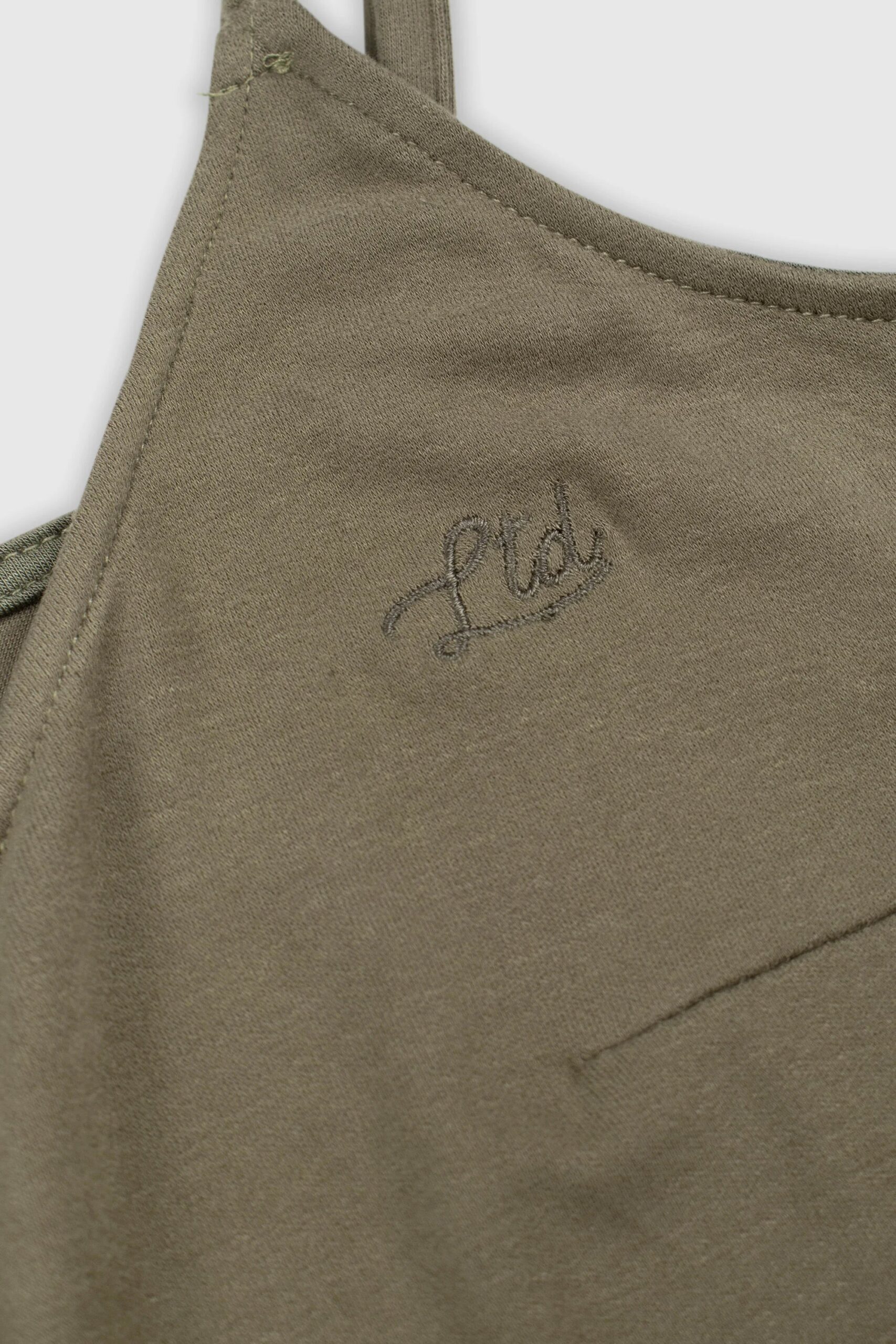 ROMPER-BUTTON-PEAT02.jpg ROMPER-BUTTON-PEAT02.jpg